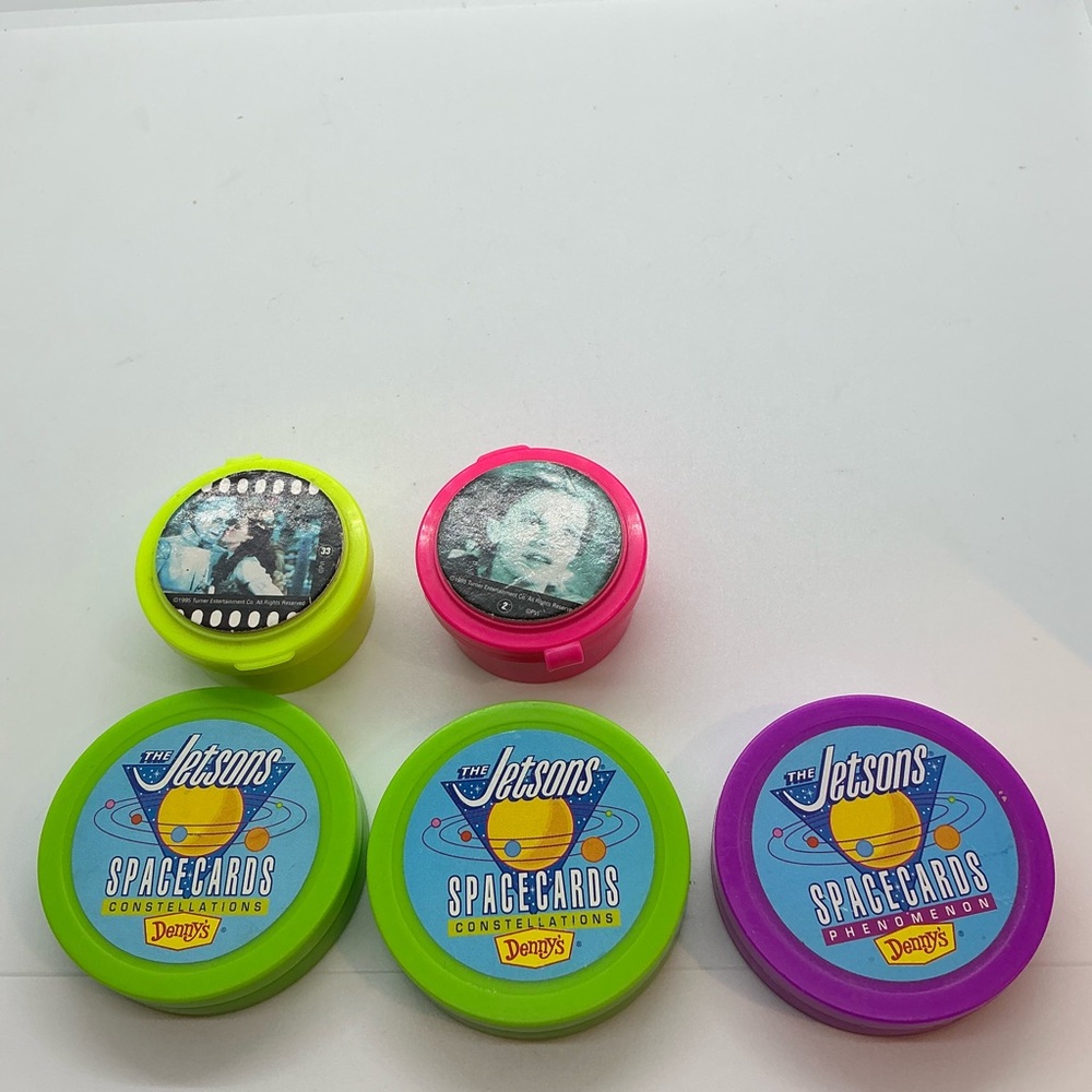 Vintage 90’s Wizard of Oz And Jetsons Slammers and Pogs in carrying cases Games